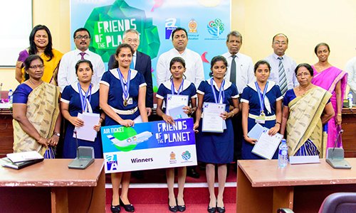 (L-R) Back row: <b>Mrs. Chethika Hapugalle</b>, General Manager, <b>Double A</b> Sri Lanka; Mr. A.S. Hewage, Additional Secretary (School Activities), Ministry of Education; <b>Mr. Thirawit Leetavorn, Double A</b>’s Senior Executive Vice President; <b>Mr. Akila Viraj Kariyawasam</b>, Hon. Minister, Ministry of Education; <b>Mr. W. M. Bandusena</b>, Secretary, Ministry of Education; <b>Mr. M. J. J. Fernando</b>, Deputy Director General, Environmental Education & Awareness Division, Central Environmental Authority; <b>Ms. Damayanthi Balasuriya</b>, Director of Education (Agriculture and Environmental Studies), Ministry of Education; front row: <b>Mrs. A. Thevakanthan</b>, Project Teacher; Members of the winning team, namely, <b>Ms. Primraj Ravichandra, Ms. Abarna Kumarakuruparan, Ms. Litharshika Sadatchararajah, Ms. Thuwaraha Suntharalingam</b>, and <b>Ms. Tharshana Thevaraj;</b> and <b>Mrs. R. Kanagasingam</b>, Principal, Vincent Girls’ High School – Batticaloa during Friends of the Planet awarding ceremony.